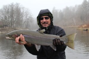 Mitch, also from west MI, with a nice male steelhead that took us for quite a ride before coming to net.