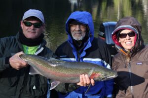 A nice spring steelhead brought to the net by Heidi (right)