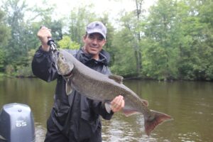Jim P., from SE Michigan, with a nice early run Chinook salmon caught on the Pere Marquette river